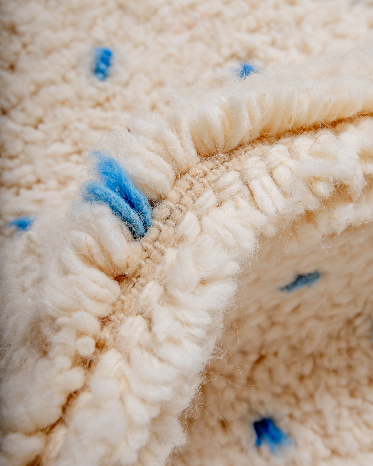 Modern, designer, handcrafted Berber rug from Morocco. Beniourain carpet with beautiful colours and patterns and fluffy wool texture.